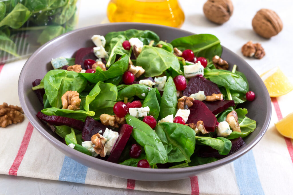Salad With Young Spinach, Boiled Beets, Blue Cheese, Nuts, Cranb